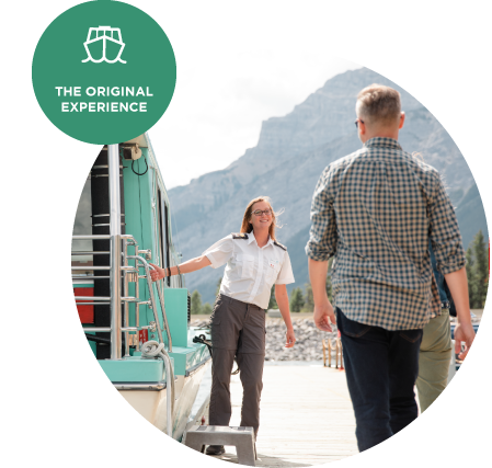 Captain greeting couple arriving at boat