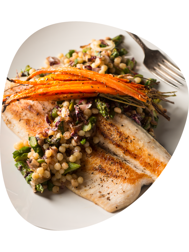 A plate of fish on a dinner plate.
